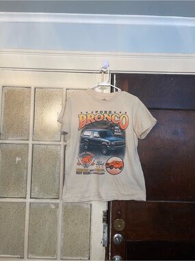 Ford Bronco Graphic Tee in Beige with Orange and Blue Print - Size Medium